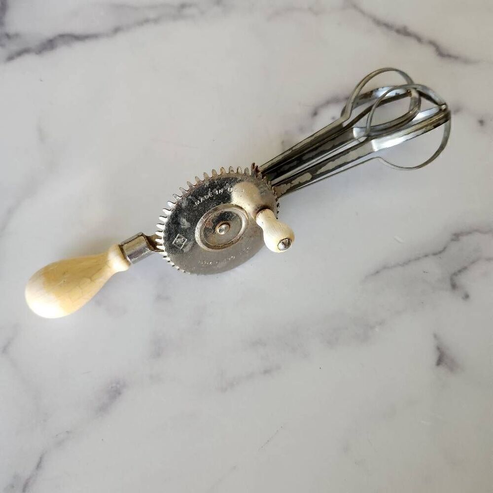 AJ egg mixing beater vintage hand mixer cream handle silver frame